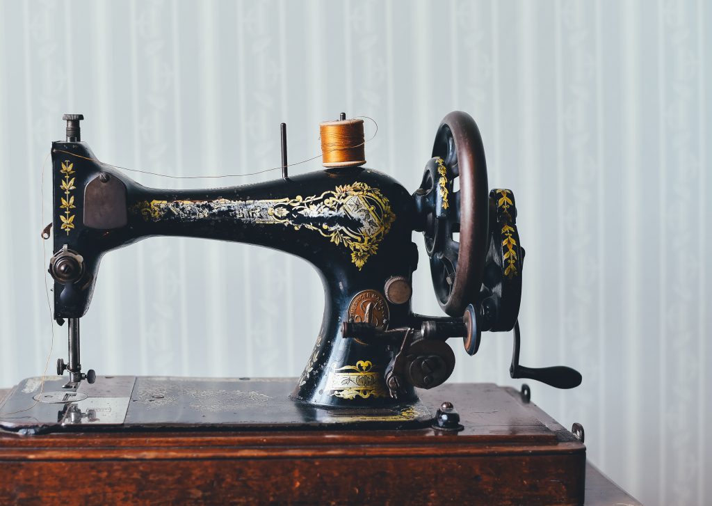 Black and yellow antique sewing machine