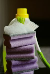 Foaming cleanser on a stack of sponges