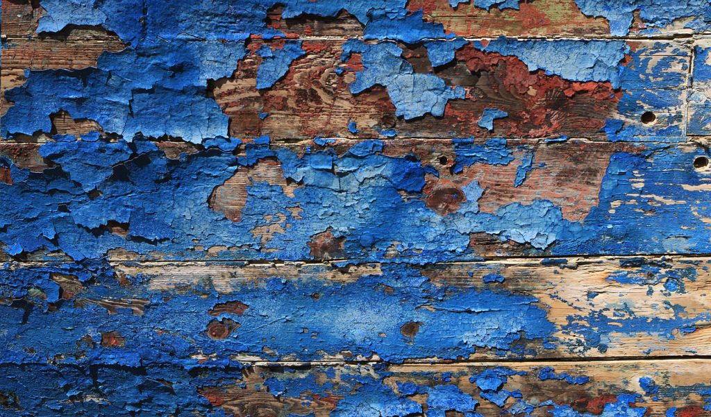 Antique wood with chipping blue paint