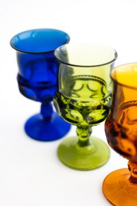 Depression-era blue, green and orange glass goblets