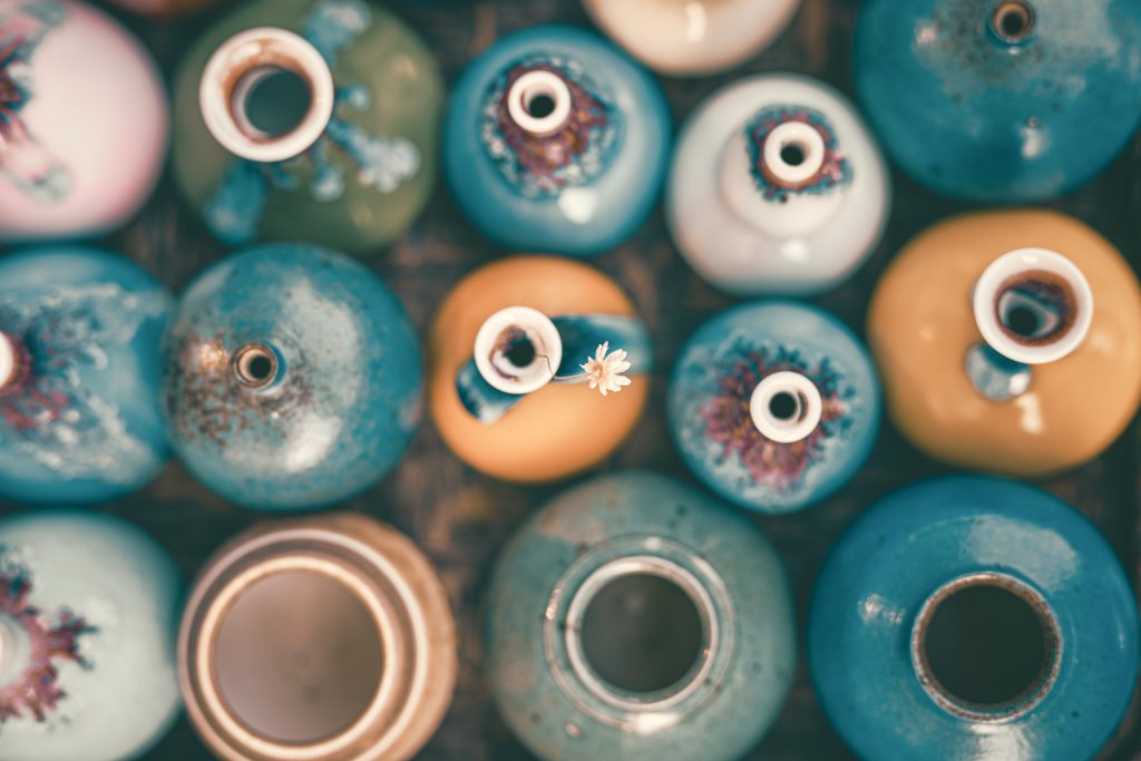 Multicolored ceramic vases viewed from above